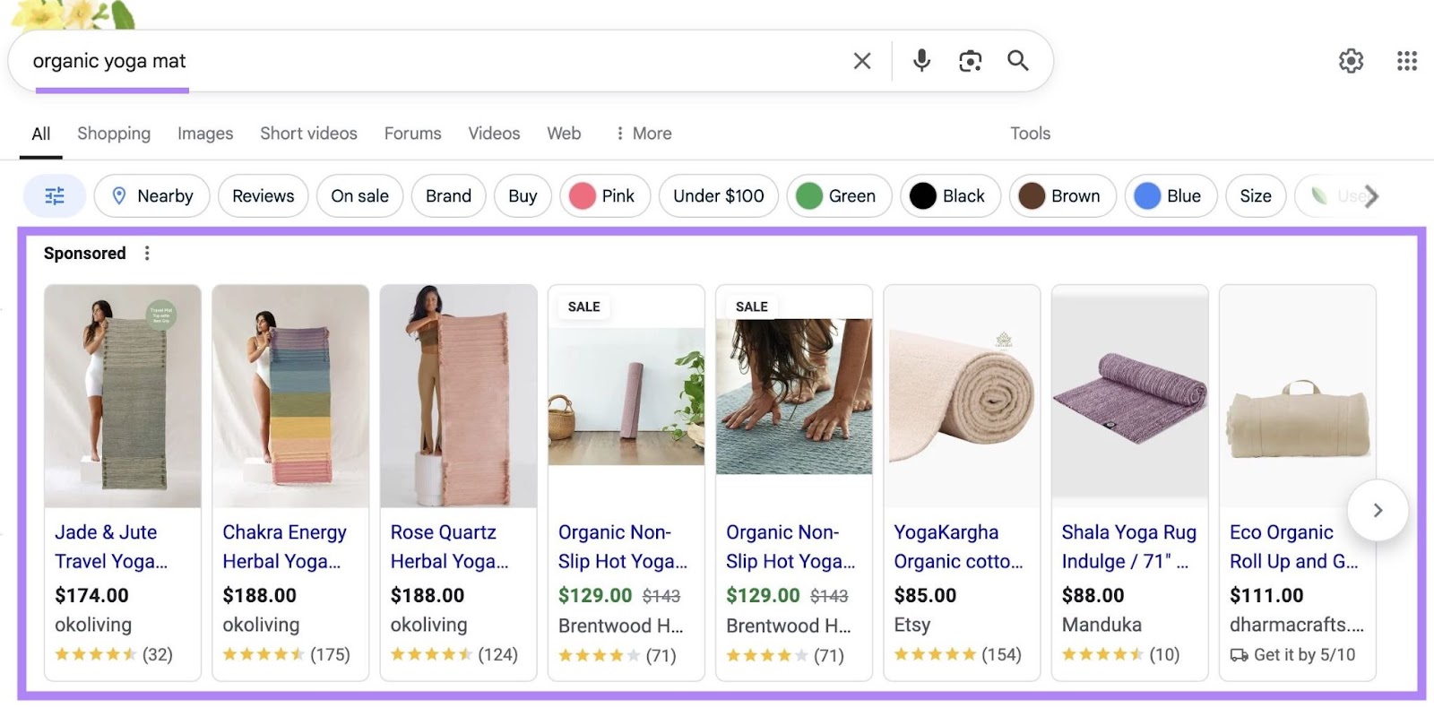 Google SERP with "organic yoga mat" entered as the term and the sponsored results on top of the page highlighted.